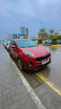 كيا سبورتج 2018 امريكي للبيع كلين وبيها البابين اليمين بارد  موجودة صو...