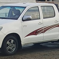 هايلوكس 2014 رقم بصره دولي  بسمي سنويه ل29 شاصي12 السعر185وبيها مجال 0...