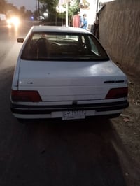 بيجو 405 موديل 2010. رقم بغداد سياره جاهزه عوزها ترتيبات سعر 23 للاستف...