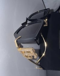 دولجي • اسود • ذهبي