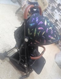 عربانة طفل • مستعمل قليل • تواصل خاص