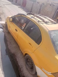 افيو 2009 امريكي مسكر مكينه كايمه   كير جديد دواخلها حلوه وكشرتها نضيف...