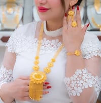 ذهب • مجوهرات • عيار٢١