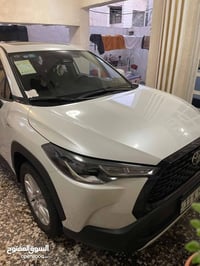 كورلا كروز 2025  رقم بغداد بأسمي  مكفولة كفالة عامة  ماشية 14  الف  مك...