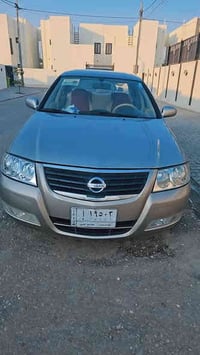 نيسان سني 2012 ..جهة السايق والبنيد بيهن رش صبغ بس ابيع حزام ..حداديه ...