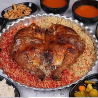 دجاجة محشية ١٫٦كغ • مندي مدخن • توصيل مجاني الموصل