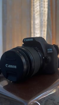 Canon EOS 2000D السلام عليكم للبيع فقط كاميرا كانون EOS 2000D اخت الجد...