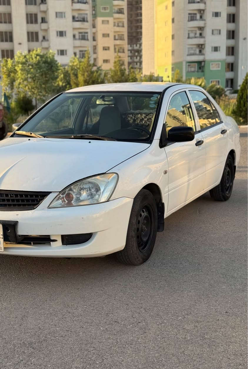 لانسەر٢٠٠٧ گیر تۆماتیک مەکینە بچوک زۆر خاوینەو مالی دۆستە یەک دینار مەسروفی تیدا نیە *********** أربيل, العراق
