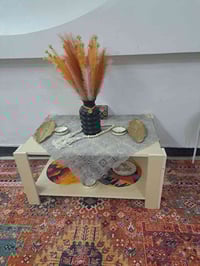 طبلة وسطية • طاولة