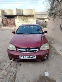 فورنزا 2008 رقم بغداد كليزي مصبوغه حزام كير محرك كفاله تبريد معوز غاز ...