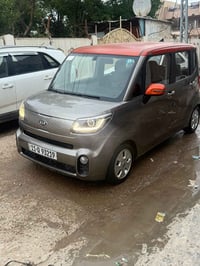 كيا رأي موديل 21 لون زيتوني سعرها 82 ورقة وبيها مجال مكاني بغداد الدور...