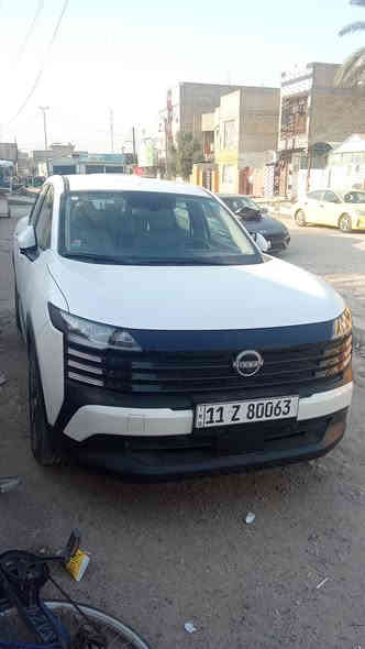 سيارة نيسان كيكس موديل 2025 سيارة ماشية 450 كيلو مكفولة كفالة عامة ربع كامرت سعرهه 200 وعشرين ورقة العنوان بغداد حي اور *********** ابو امير
