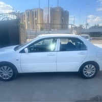 لانسر • ٢٠١١ • محرك ٢٠٠٠