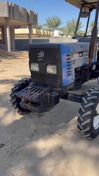 مكينة نيوهولند • ٢٠٠٢ • بابل جبله