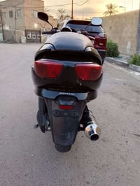 دراجه فورزا      صفر 8 الدرجه كامله مابيها اي نقص  سعرها 900 مكاني بغد...