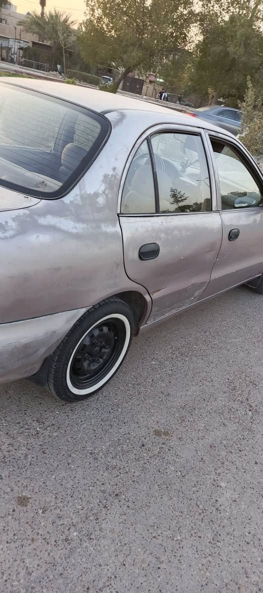 هونداي اكسنت موديل 95 مكينه مكفوله صدر جديد تخم تاير جديد كهربائيات شغاله بدون صبغ  والاتبديل السعر 30عنوان بغداد البياع رقم الهاتف ***********
