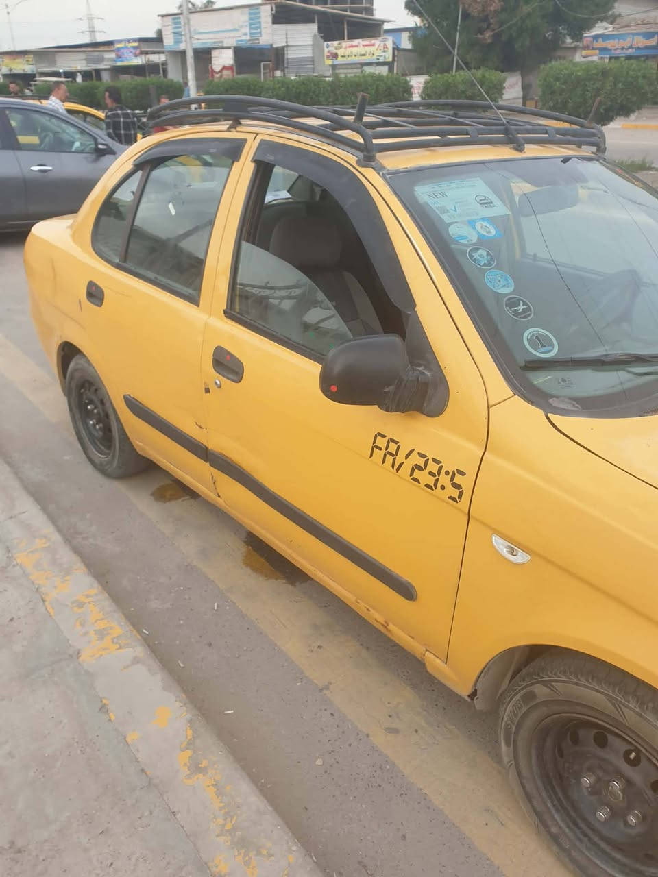 سلام عليكم طيبة ٢٠١٥ مصفرة هيئة  وغرامات السعر ٢٦ ورقة وبيها مجال بسيط على الرقم التالي *********** العنوان بغداد الشعلة
