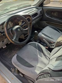 بروتون 2002 سنويه جديد السياره بسمي بي دفتر بانزين سياره جديد من كول ا...