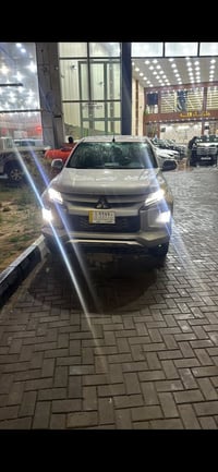بيكم مستوبيشي L200 مديل 2022 ماشيه 120 كيلو    كاز  باب مصبوغ  وجاملغ ...