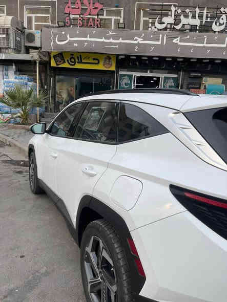 السلام عليكم للبيع هيونداي توسان هايبرد فول اعلى مواصفات السيارة الموديل2023 رقم بغداد الجديد محرك 1600 توربو هايبرد 
فول 1/1
جزء من مواصفات السيارة 
بانوراما 
شاحن وايرلس
بصمه تشغيل و ابواب 
الكراسي جلد 
 وتبريد و تدفئة
 والخلفية تدفئة 
كرسي السايق خزن ميموري 
كامرات ٣٦٠ درجة و تشتغل الكامرة الجانبية وية الاشارة
رادار امامي 
حساسات
اوتو ستوب 
هاند بريك بصمة و اوتو هولد  
صندوق كهرباء 
تحكم ستيرن جهتين 
ستيرن تدفئة 
النقطة العمياء بالمرايا الجانبية
السيارة ماشية 47 الف ميل قابل للزيادة 
ورقم الشاصي موجود بالمنشور لليريد يشوف صور الحادث سعر ب210 اتصال او وتساب 
للاتصال *********** بغداد
