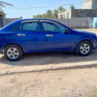 ٢٠٠٥ • مكينة وكير بخير • شاشه وكامره خلفية