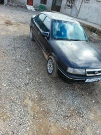 أوبل حجم  20 كير شرط ومحرك بي صرف بشرط تحويل  بيها كابون بانزينن السعر...