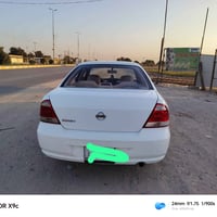 نيسان مثنى ابيض موديل 2012 سنويه ساقطه  السعر 100 وبيه مجال بيع او مرا...