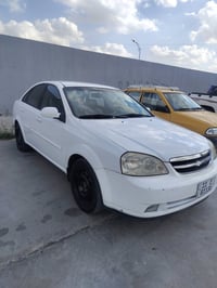 اوبترا 2012 رقم بغداد انكليزي مكفوله كفاله عامه ما بيه لا صبغ لا تبديل...