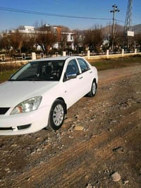 لانسر • ٢٠١١ • اوتوماتيك