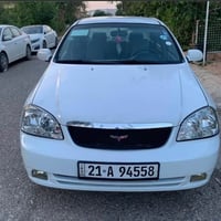 أوبترا ٢٠١١ • قير أوتوماتيك • أبيض