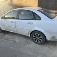 سياره اوبترا 2010بغداد بسمي تخم تاير تبريد سعرها 80وبيها مجال 07700537...