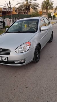 اكسنت 2009 للبيع محرك 1400  سيارة ماشية 51 رقم بغداد مميز السيارة بأسم...