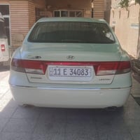 ازيره 2007رقم بغداد بسمي امريكي فول موااصفات محرك وكير حاويه جديد كهرب...