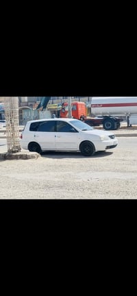 كارنز 2004  سياره جاهزه 07838602098   محرك 2000  تبريد +تدفئه   كاعيه ...