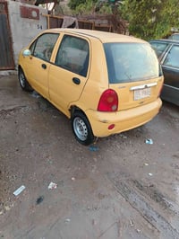 كيو كيو • موديل ١٢ • رقم بغداد