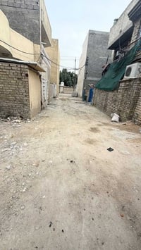 قطعة ارض للبيع بغداد الزعفرانية شارع الجواهري الفرع الثاني 100 متر واج...
