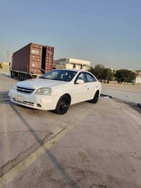 أوبترا ٢٠١٢ • ابيض • مكفولة