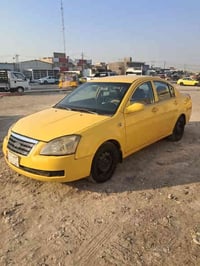 للبيع شيري اي فايف موديل ٢٠١٠ مصفره هيهة وغرامات مكينه وكير كامري يابا...