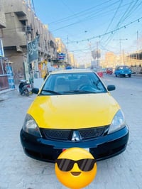 لانسر • ٢٠٠٧ • ضربه أمامي