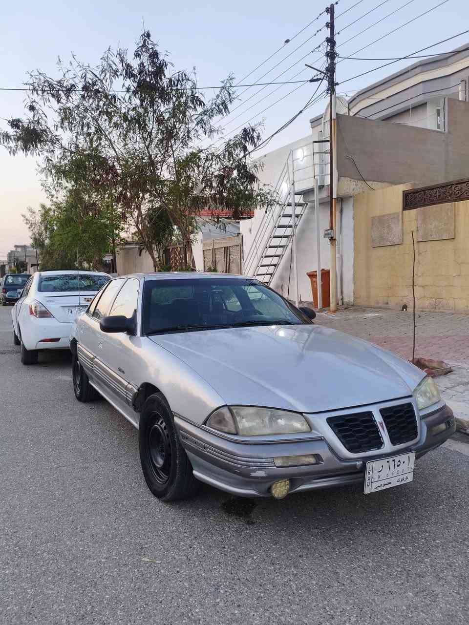 سلام عليكم بونتياك جراند أي ام موديل 1993 رقم ألماني سنوية منتهية  محرك 3300 V6 كير محرك بشرط سيارة ع البلاد صبغ عام جمالية حدادية 80% باتري جديد غرفتها كلش حلوة سيارة نظيفة وع البلاد حتى السيرفس طافي 
سعرها 35 ورقة بي مجال قليل مابي نواقص صرفيتها حلوة تبريد يحتاج كومبريسر 
***********  مكاني كركوك
