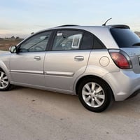 للبيع كيا ريو موديل 2011 ((مواصفات كولد )) رقم نينوى الجديد سلايت(فتحة...