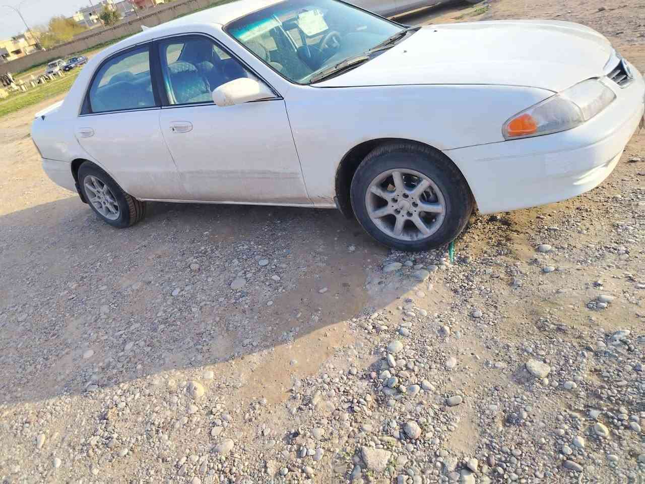 مازده موديل 2002كير محرك شرط  تبريد تدفئة تخم تاير جديد رقم أربيل تحويل ثاني يوم سرهم كراوس يرهم بيع ***********
