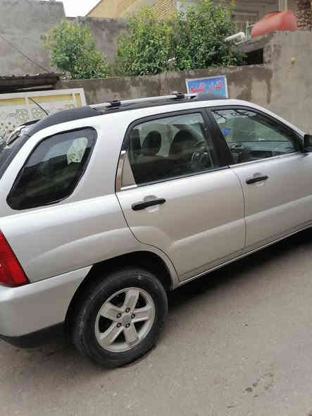 كية سبورتج ٢٠١٠ لون سلفري محرك ٢٧٠٠  ستة سلندر بأسمي رقم بغداد الرقم الجديد ضررها جاملغ أمامي نفسه مصلح وبيها جراد السيارة جاهزة مابيه اي نواقص السعر ١٠٠ ورقة وبيها مجال للشراي
رقم
***********
***********
