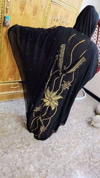 ملبوس ساعه • ملابس
