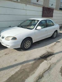 هونداي النترا موديل ٩٩ مكينه كورلا اوتو ماتيك رقم بغداد ٣١ وبيها مجال ...