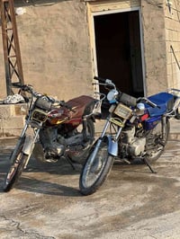 عندي تايكر ٢١ للبيع لون ازرق تفاصيل هذا رقمي  07801533765