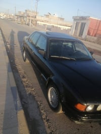 BMW735i  رقم نينوى شرط التحويل  سنوية خضرة  كير عادي  محرك ٣٥٠٠  كير و...