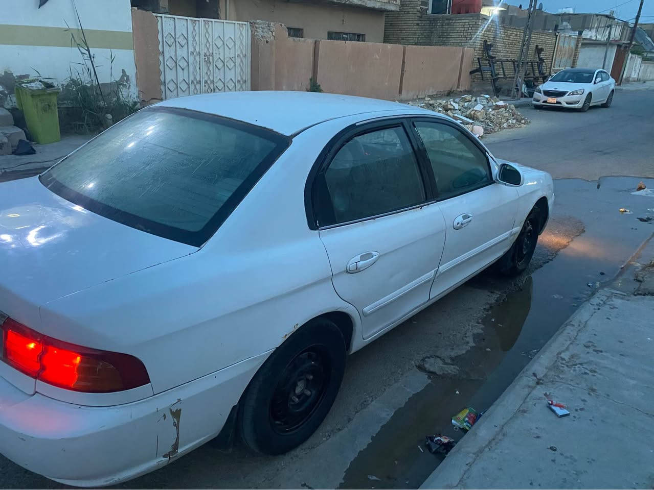 كيا اوبتما 2002 خليجي للبيع موضح بصوره مكينه وحداديه وكير جديد وباتري وتايرات جديدات السعر 35 وبيها مجال سنويه جديده ب اسمي رقم بغداد المكان واسط العزيزية  *********** الصويرة, واسط
