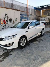 كيا اوبتيما خليجي موديل 12  مواصفات عاديه تحكمات وشاشة وشفتات  مري شفط...