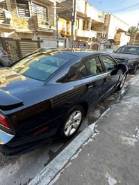 للبيع فقط جارجر 2013رقم سليمانية بسمي لسيارة  ضربتهة من امريكا جاملغ و...